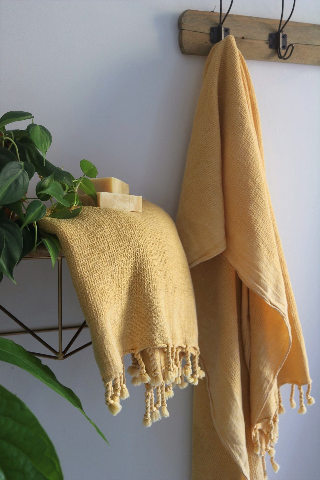 https://www.madetrade.com/cdn/shop/products/anatoli-co-waffle-weave-turkish-towel-mustard-turkish-towels-anatoli-co-258189.jpg?v=1602473144